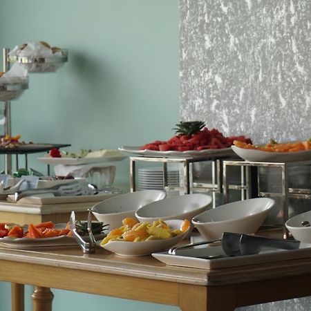Quo Quality Hotel Manizales Exterior photo A buffet