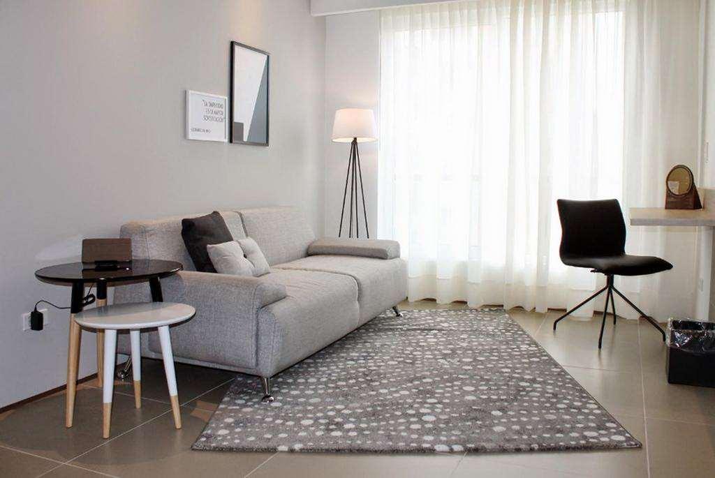 Quo Quality Hotel Manizales Room photo A living room with a rug