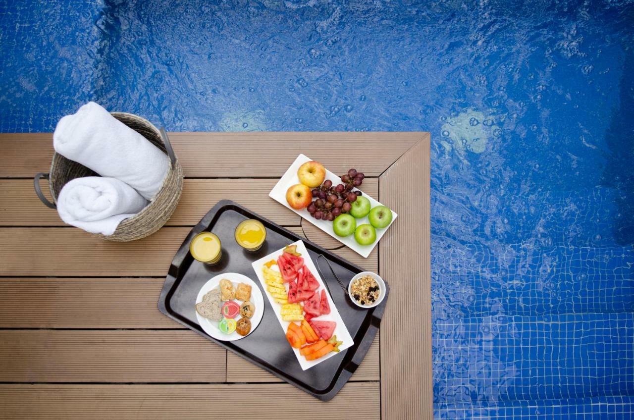 Quo Quality Hotel Manizales Exterior photo A poolside snack